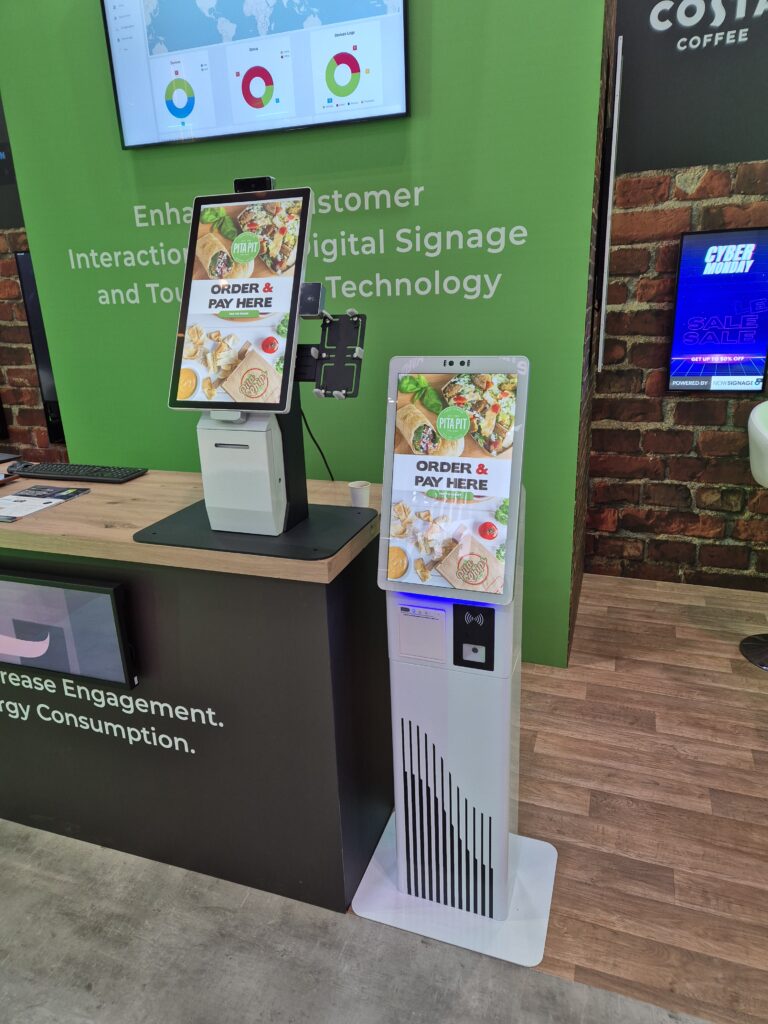 Self service kiosks on the LamasaTech stand at an event.